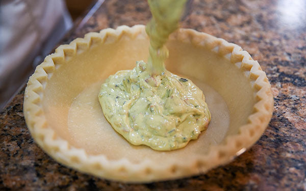 Image of pouring filling into pie crust