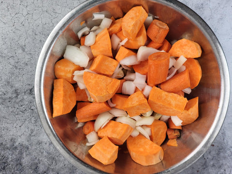 Image of yam pieces in a mixing bowl