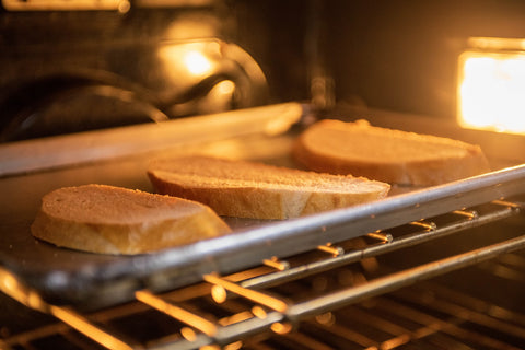 Image of bread toasts in oven