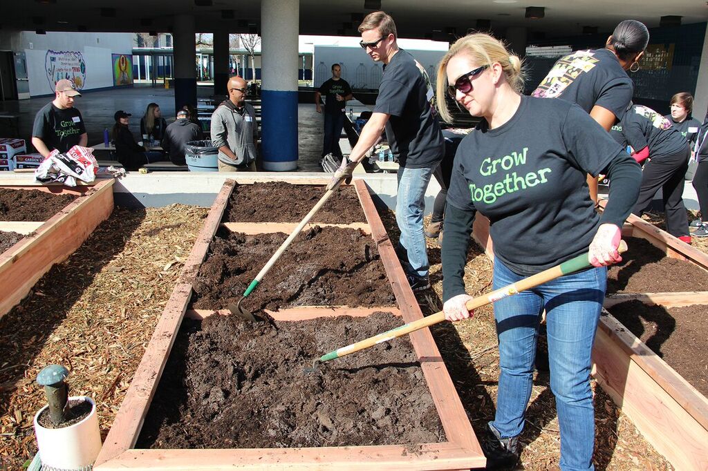 Melissa's volunteer making garden for kids