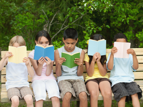 Kids reading thanksgiving books 