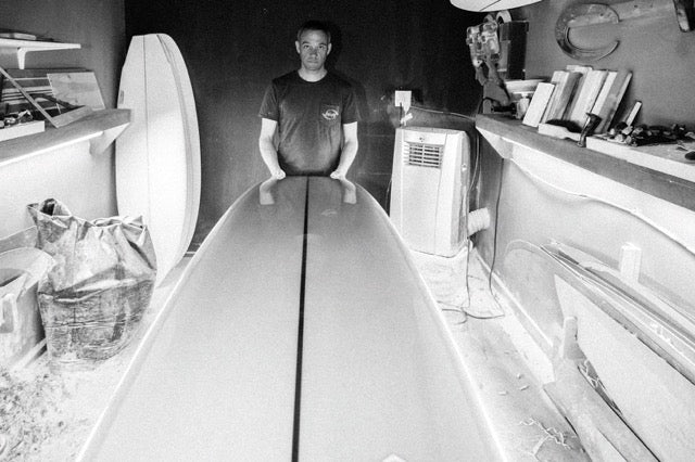 Matt Calvani with surfboard