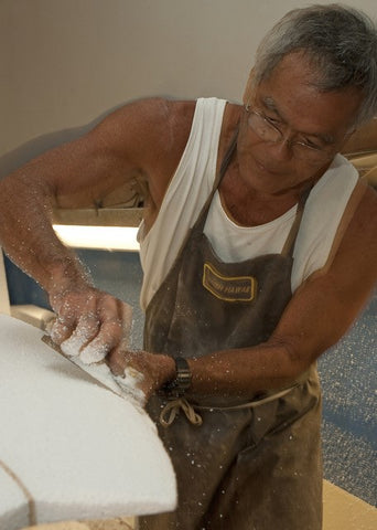 harold iggy shaping a surfboard