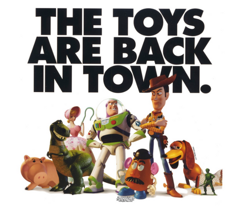 toy story characters stands under text, "the toys are back in town"