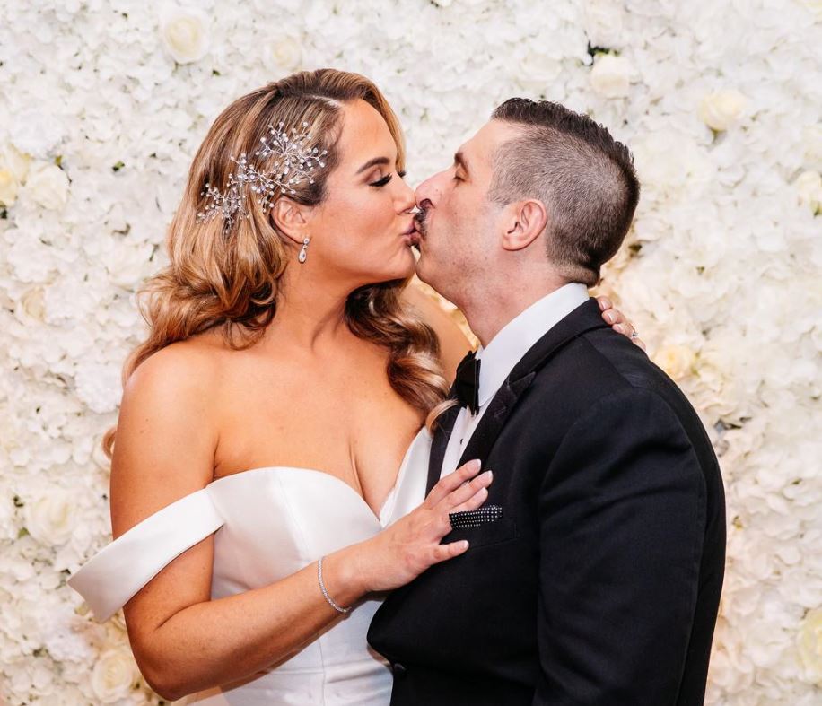 Bride and groom kissing