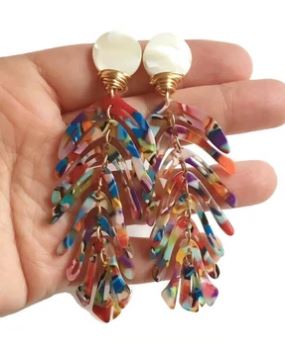 multi color leaf shaped statement earring with white mother of pearl top piece and yellow gold wiring