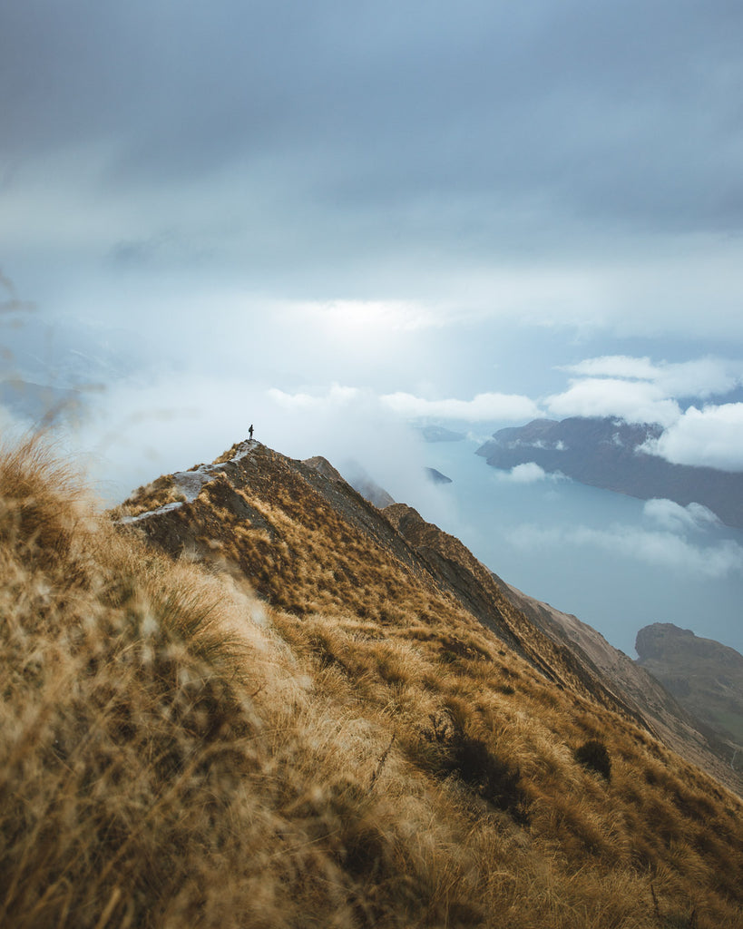 Standing on a mountain top during a break between rain in New Zealand