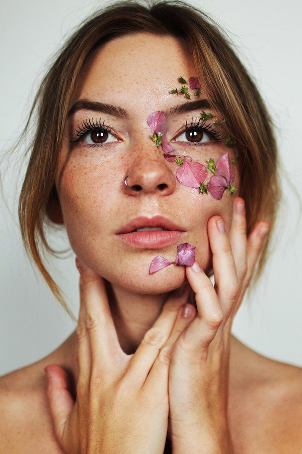 Headshot of girl with glowing skin 