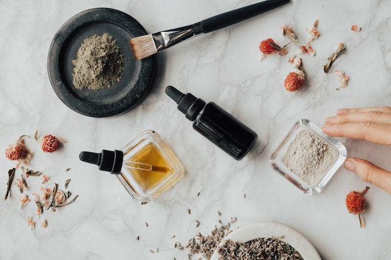 mixing a clay mask for skin benefits