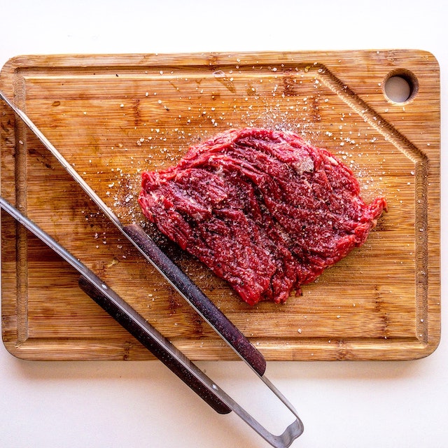 healthy salted raw meat on cutting board