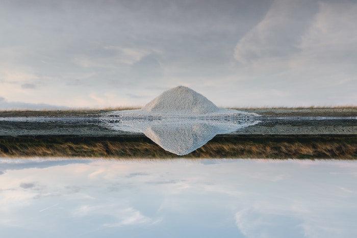 view with a salt mountain in the distance