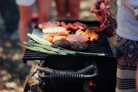 Photo of a Variety of Meats Being Grilled