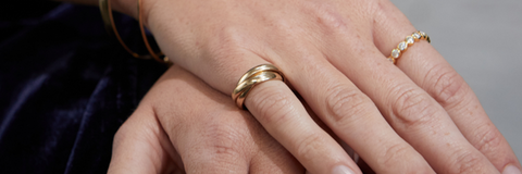 russian wedding ring shown on the pinky finger