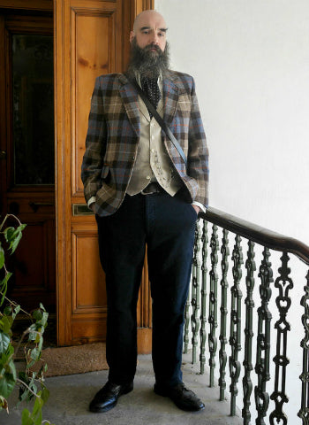 blue-plaid-coat-brown-gingham-shirt-vest-wearing-ascot-mens-sharp-casual-winter-outfit-ideas-with-boots-1