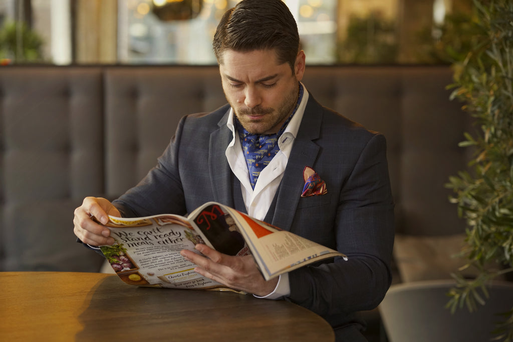 Cravat Club model reading magazine lockdown learn a new skill