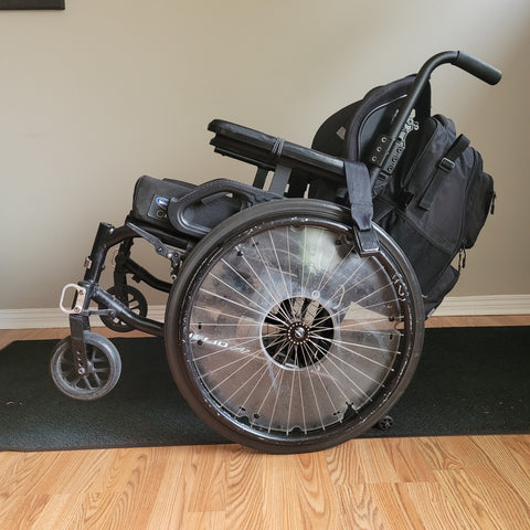 My wheelchair backpack is heavy, at 14.5 pounds it can tip my wheelchair backwards!