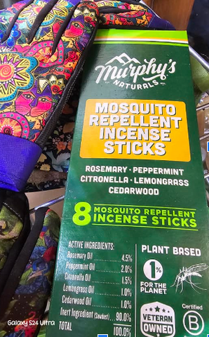 A green box that says in white: Murphy's Mosquito Repellent Incense Sticks. Rosemary, Peppermint, Citronella, Lemongrass, Cedarwood. 8 Sticks, among other information