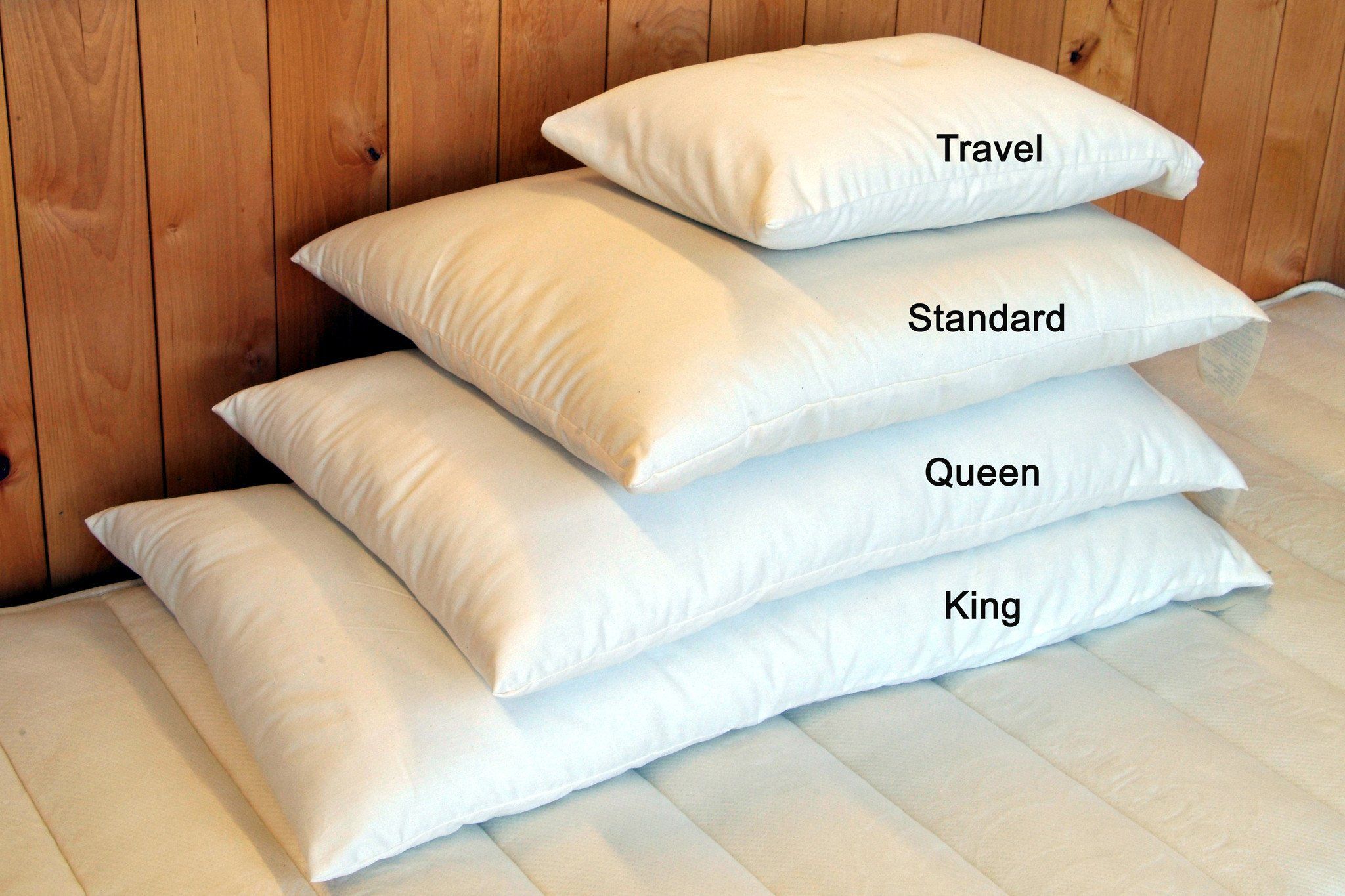 king pillows on queen bed