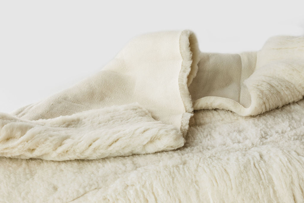 sheepskin crib mattress pad