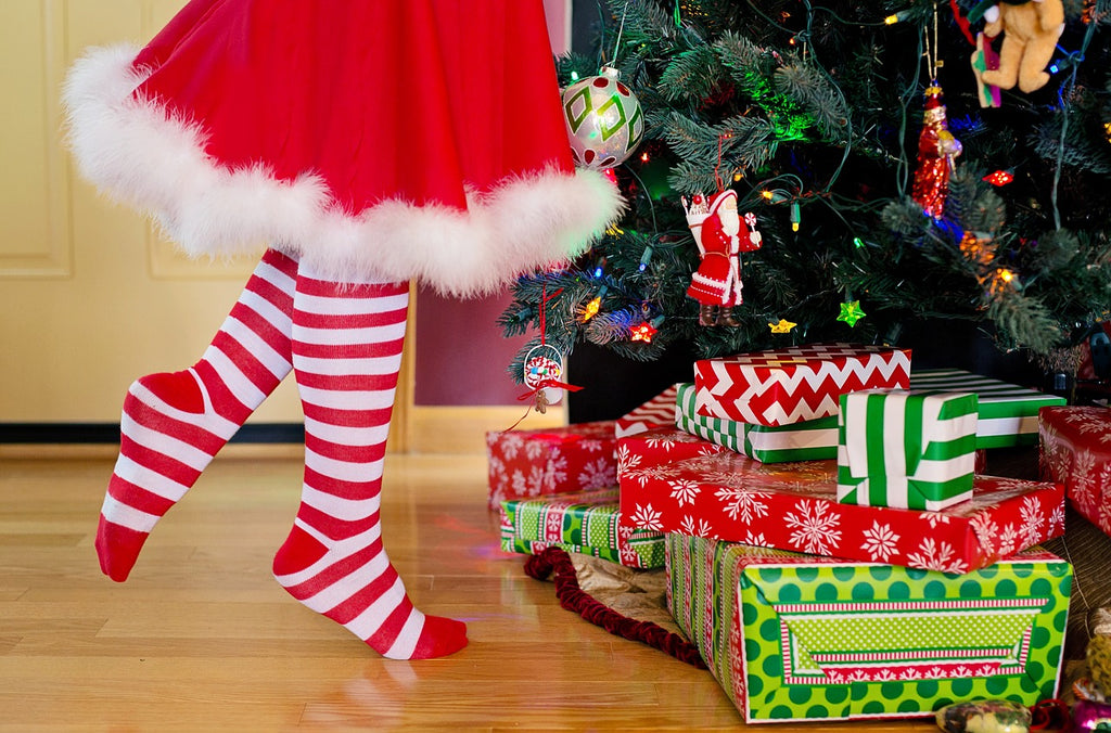 Woman decorating christmas tree