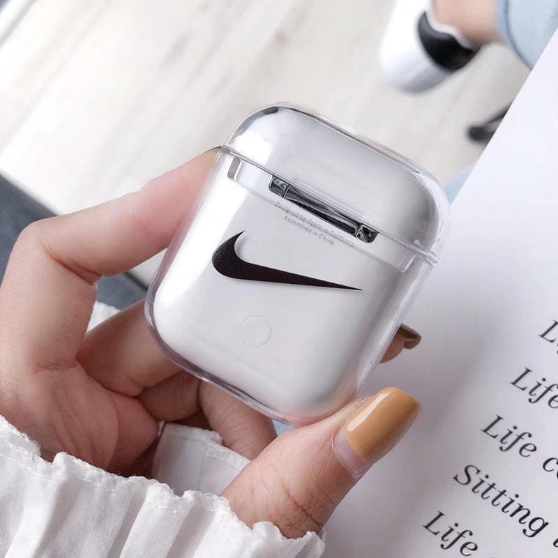 Apple airpods case. Кейс для AIRPODS 2 Nike. Чехол на аирподс 2 Nike. Чехол для AIRPODS Nike. Аирподс с айфоном 1.