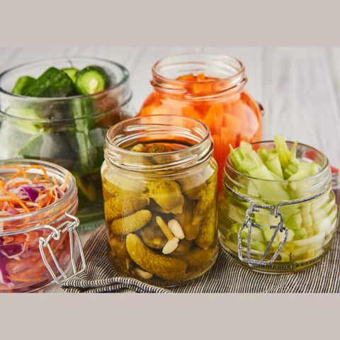 Fermented foods like kimchi, sauerkraut, kefir, kombucha and fermented green papaya contain beneficial bacteria that can potentially influence the gut-skin axis. Probiotics found in these foods might help maintain a balanced gut microbiome, thereby contributing to healthier skin.