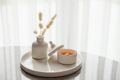 Illuminate your space with the warm glow of Lukata scented candles.