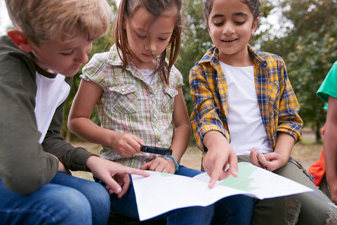 Children using a map