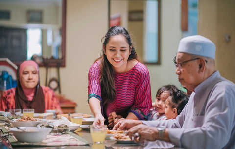 Family enjoying eating together during Eid al-Fitr