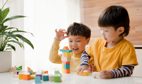 Children building towers