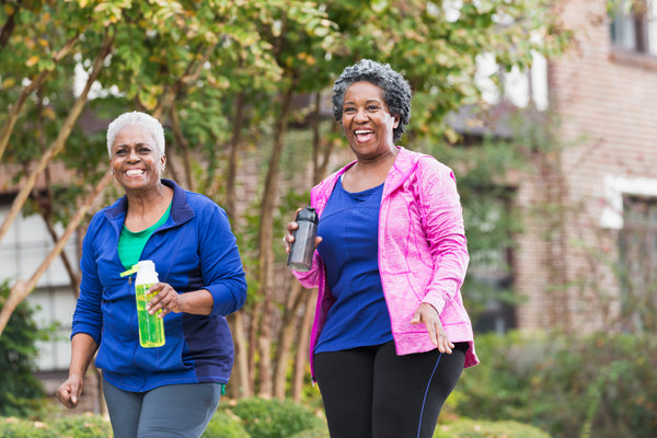 Ladies walking and drinking water