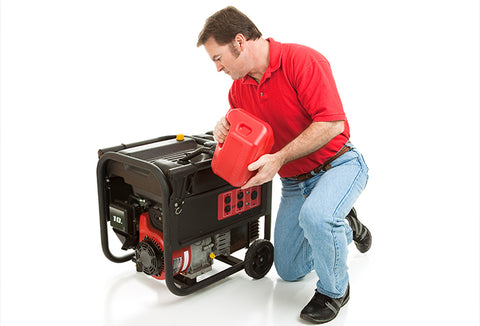 A man wearing a red shirt pouring gasoline into a gas-powered generator.
