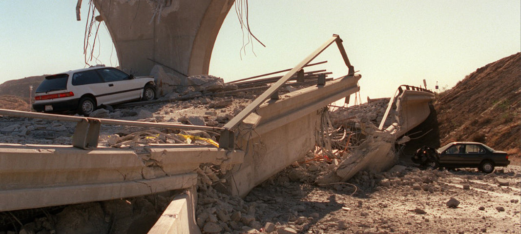 Car under collapsed freeway