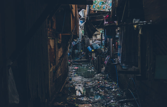 flooded alleyway full of trash