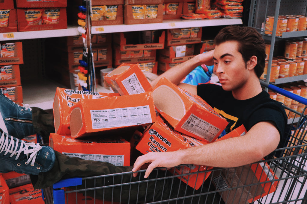 Man in grocery cart