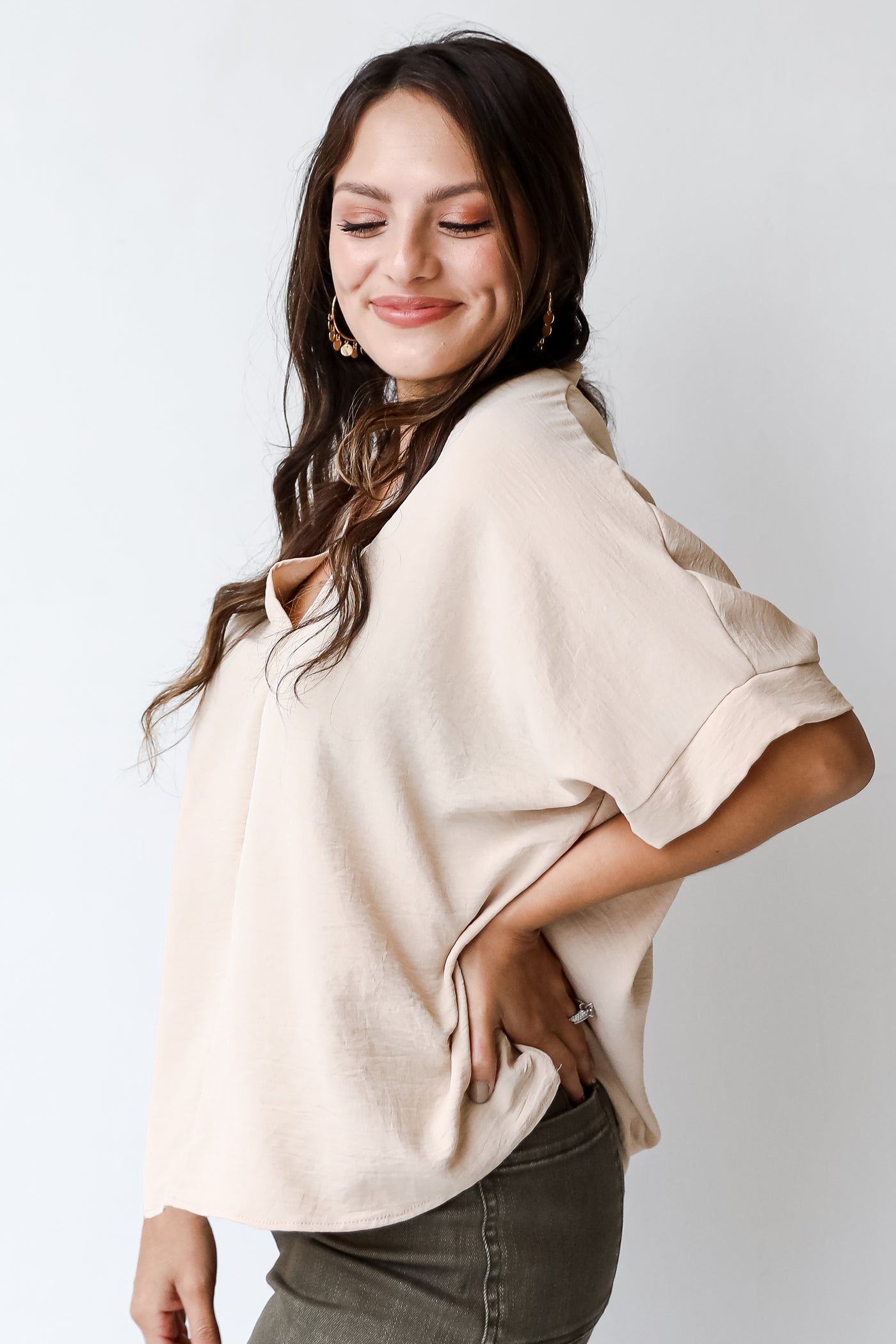 taupe blouse side view