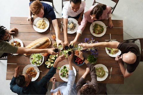 Friends Enjoying Meal Together