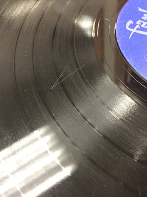 Scratched record