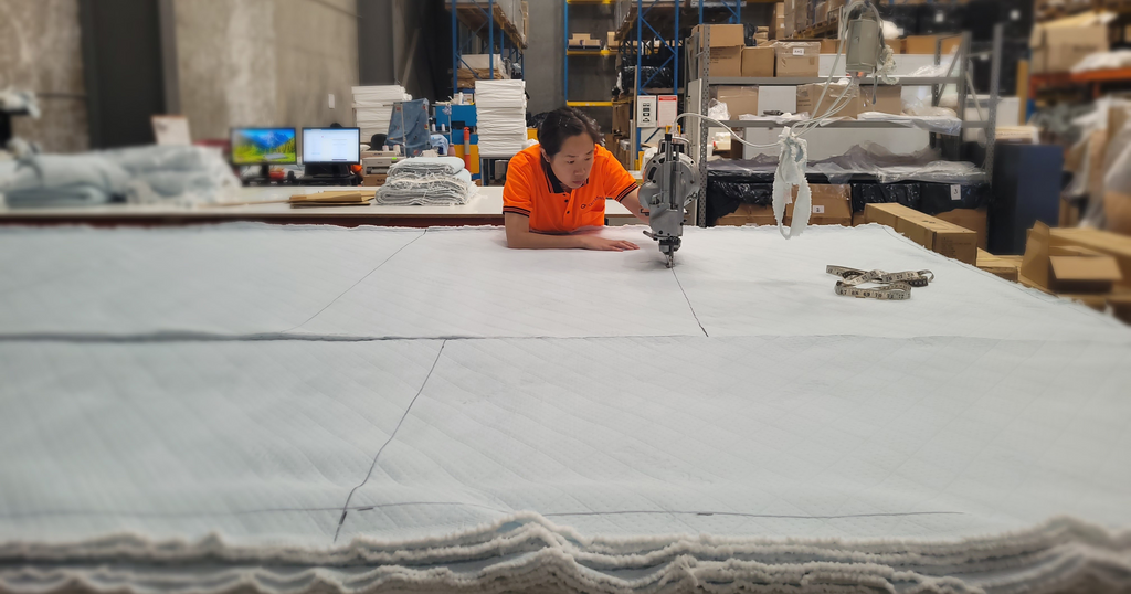 Mattress material being cut in the Production department