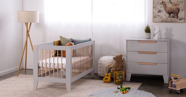 Babyrest Hague cot and chest in grey, pictured in cosy nursery setting