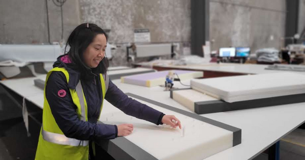 Mai preparing the raw materials for a Melbourne made baby mattress