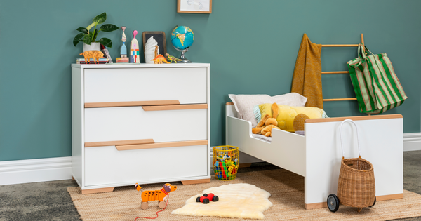 Babyrest lambskin rug in colourful toddler room setting