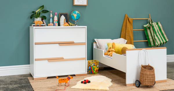 Toddler room featuring a Babyrest convertible bed