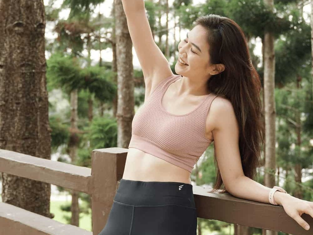 a woman wearing pink gym wear in Malaysia