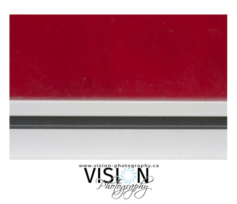 photo of red and white top is a large horizontal red stripe filling 3/4 of the frame and bottom is a white strip filling the rest of the frame