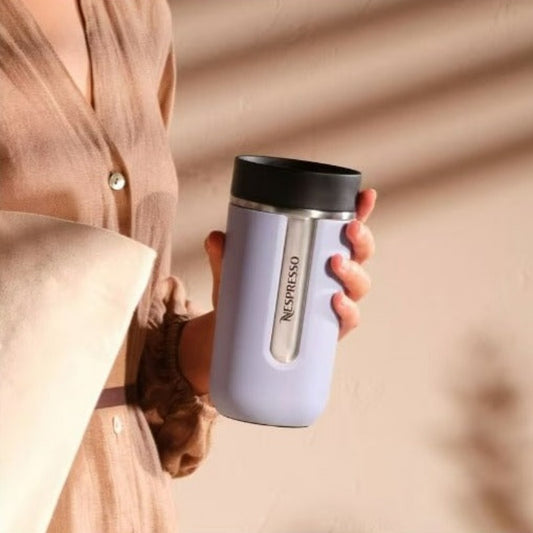 Nespresso - Wherever the day takes you, the Nomad Travel Mug lets