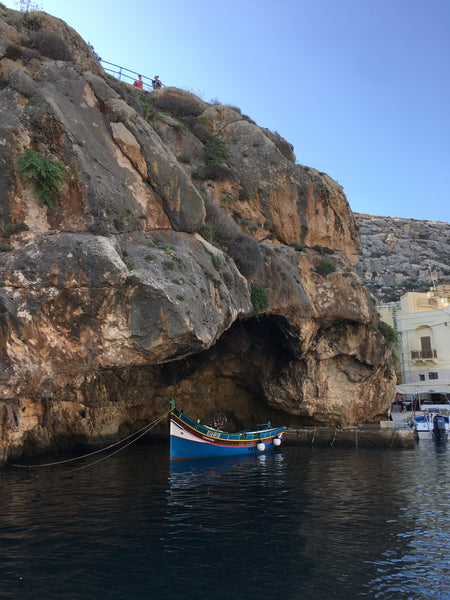 secret swimming spots in Malta - jump right off the rocks into the Mediterranean Sea