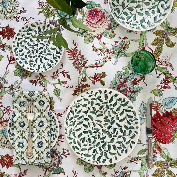 layer plates on a summer table