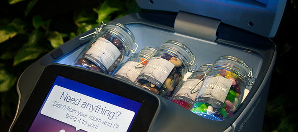 Minibar products being delivered via robot