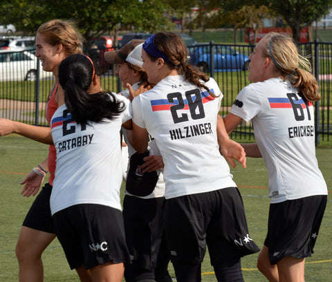 Ericksen and teammates reveling in lady shorts sisterhood.